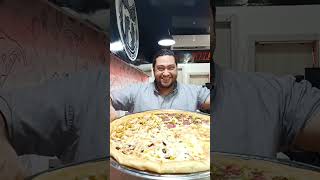 اكبر بيتزا دائريه في بنها في مطعم أوفر OVER PIZZA