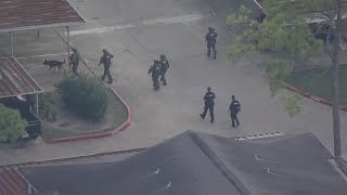 Neighborhood on edge as armed search follows deadly METRO bus shooting