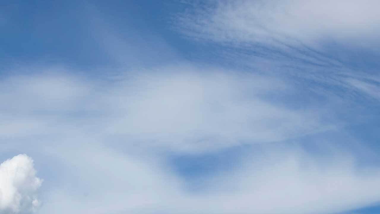 Partly cloudy and breezy Tuesday - YouTube