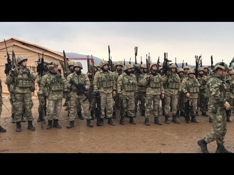 Afrin'de Türk Askeri operasyon anı öncesi hazırlık ve çatışmaya gitme anı.Vatan için yemin ediyorlar