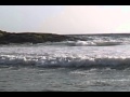 Hard waves hitting rocks at Kovalam beach