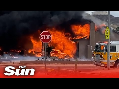 Aircraft smashes into houses near High School in Santee, California.