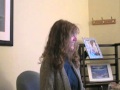Barbara Mahler answers a question through Skype