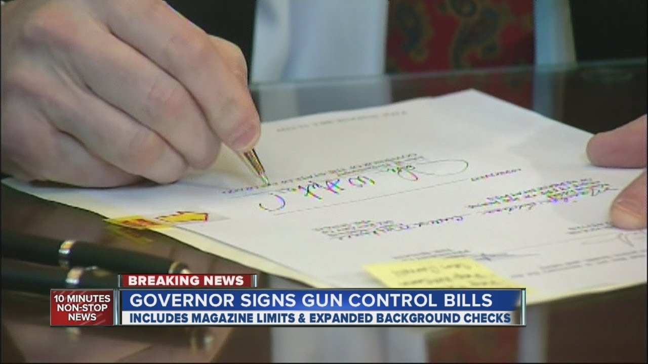 Colorado governor signs 3 gun control bills - YouTube