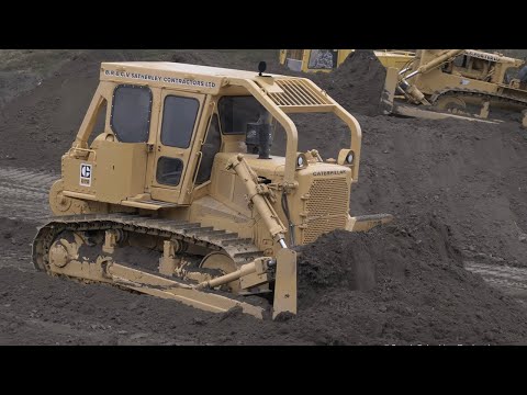 Old Caterpillar D7G Bulldozer Pushing Dirt