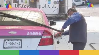 Trabajadores de gasolineras viven de propinas y sueldo mínimo