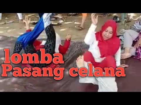 Lucunya emak- emak lomba pasang celana dak boleh pakai tangan Lucunya emak- emak lomba pasang celana dak boleh pakai tangan