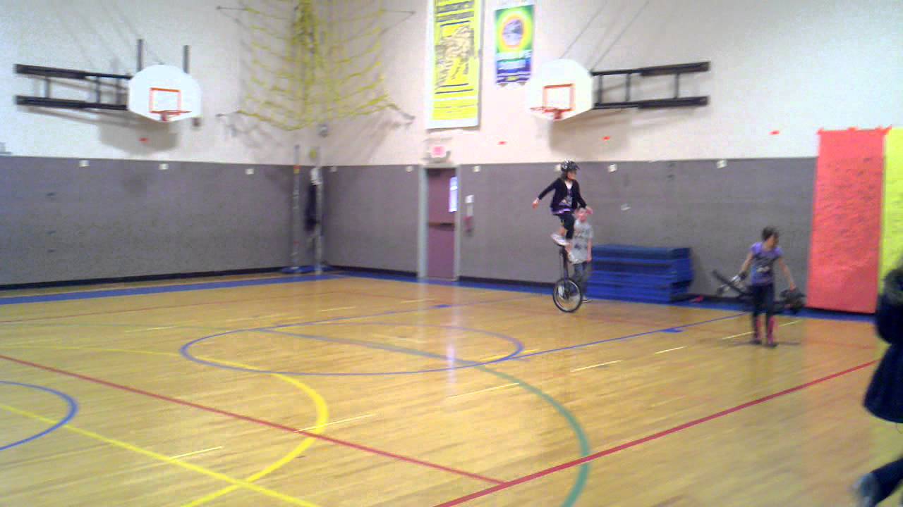 Olivia on a Giraffe (5ft Unicycle) at Liberty Elementary YouTube