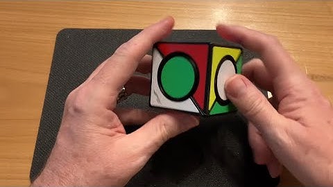 How to Solve the Six-Spot Cube