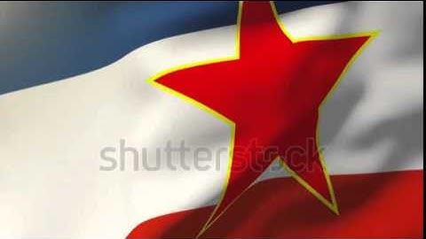 Yugoslavia flag waving in the wind. Looping sun rises style. Animation loop Stock video by