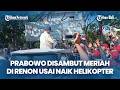 Prabowo Disambut Meriah di Renon, Bagikan Kaos kepada Siswa dan Warga Usai Naik Helikopter