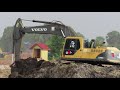 Volvo EC290BLC Excavator Digging Mud