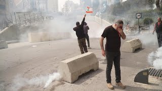 Lebanese police fire tear gas on protesters angry at economic woes | AFP