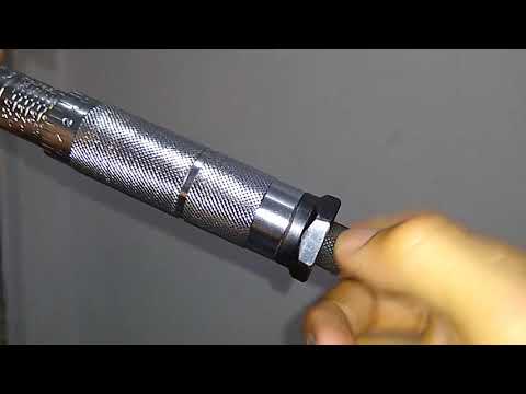 Vídeo: Como você ajusta a calibração em uma chave de torque?