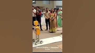 Robot to give Scissors for cutting ribbon in Inauguration