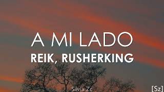 Video thumbnail of "Reik, Rusherking - A Mi Lado (Letra)"