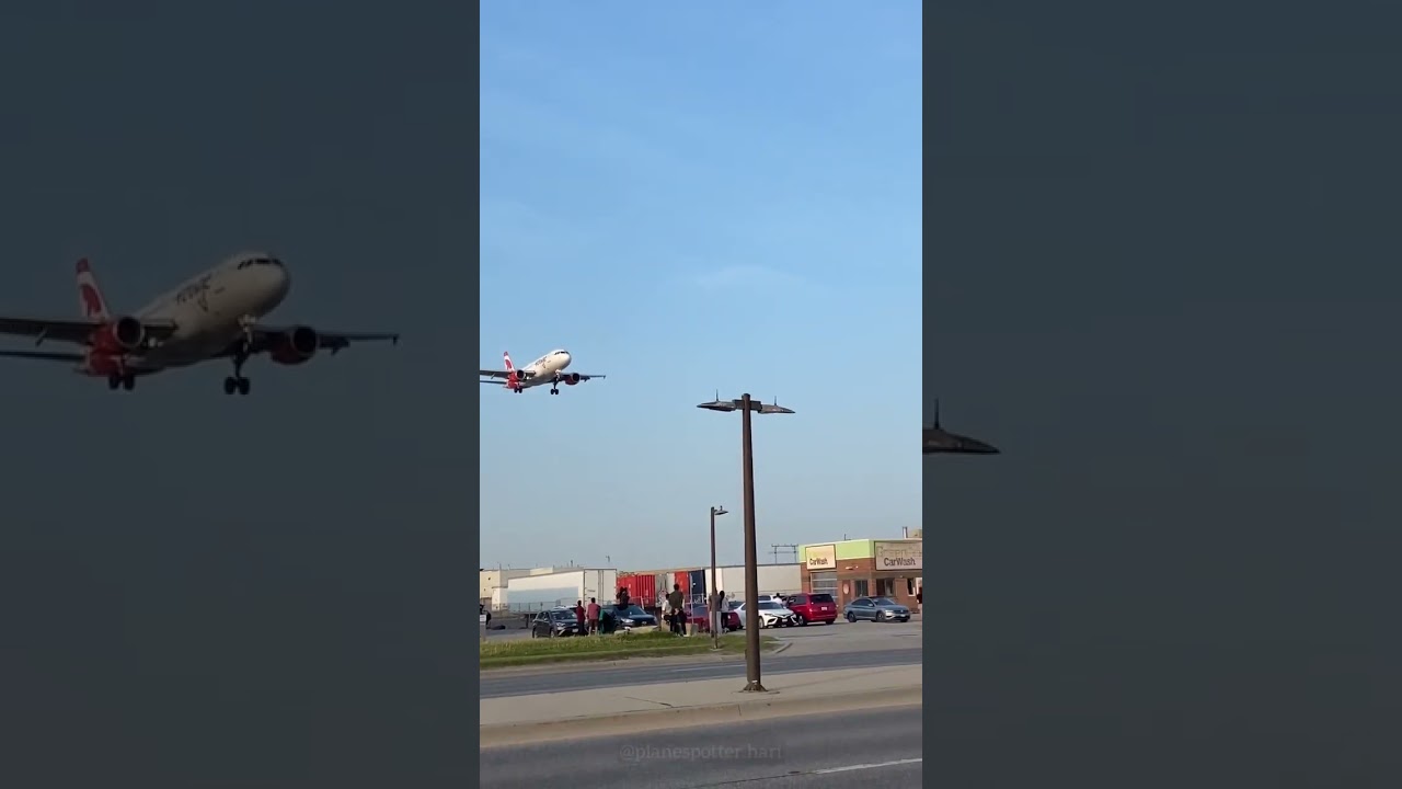 Airbus A 319 of Air Canada Rouge Landing at Toronto Pearson Airport. 