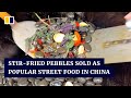 Stir-fried pebbles sold as popular street food in China