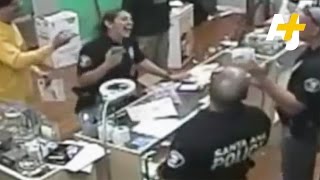 Police in santa ana, ca, raided an un-permitted pot dispensary with
their guns drawn. and then they ate the edibles while trying to
destroy video cameras...