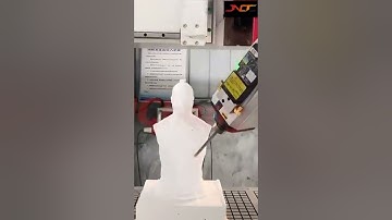 5 axis cnc router machine is engraving sculptures.