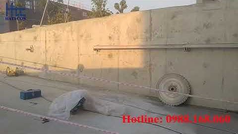 Cắt ram dốc đường xuống tầm hầm - Công ty TNHH Kỹ thuật Xây dựng Hatacon 90988.168.060)