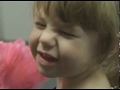 Léa, three year old with CVI has elevator lesson wearing a Toddler Cane