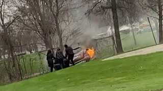 Madison Heights High School staff rescue driver from burning car
