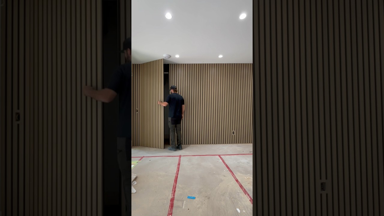 Oak slat wall with hidden door