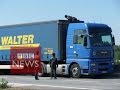 Calais: Migrant climbs into lorry (360 video) - BBC News