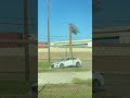 White Hyundai stuck on a giant #houston pothole