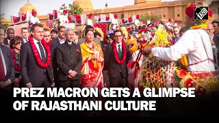 French President Emmanuel Macron gets a glimpse of Rajasthani culture as he visits Amber Fort