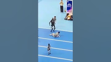 Running robot crashes into man on athletics track