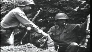 Troops return to a rest area, dig fox holes and a burning USAAF P-51 aircraft in ...HD Stock Footage