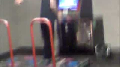 1 Guy playing 2 player DDR pretty nasty