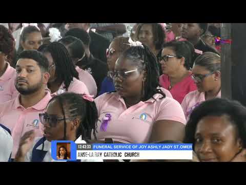 HUNDREDS MOURN JOY ST. OMER AS CALLS GROW TO END VIOLENCE