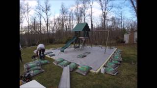 Wood border and rubber mulch around the playset Rubber mulch and wood border around the playset. We rounded all corner of 4x4 wood and stained with the same color as the