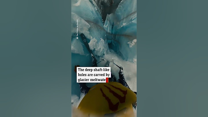 Terrifying footage captures a skier's descent into a glacier
