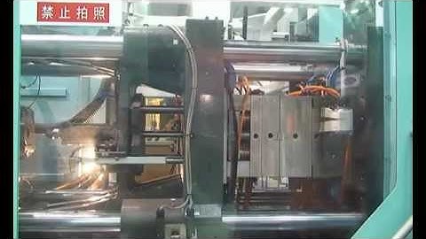 MAX Robot - In Mould Labelling System.
