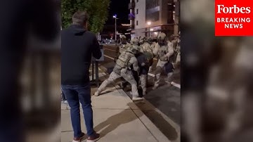 Federal Agents Shove Person To Floor During Demonstration Outside Portland, Oregon, ICE Facility