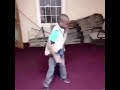 Black kid dancing to mexican music