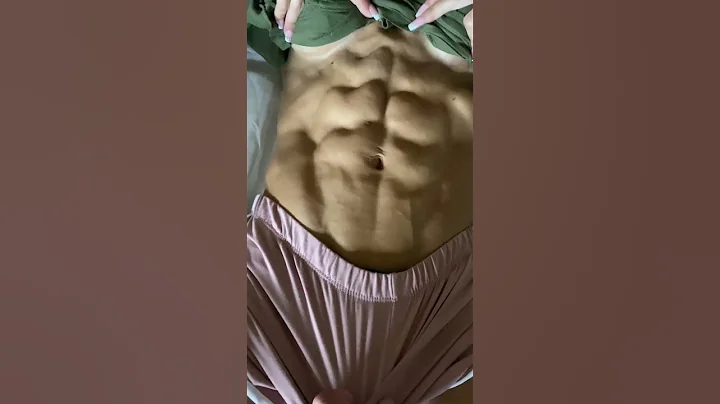 FBB Andrea Cisneros flexing shredded abs