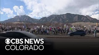 Hundreds protest outside NOAA office in Denver metro area after many employees laid off