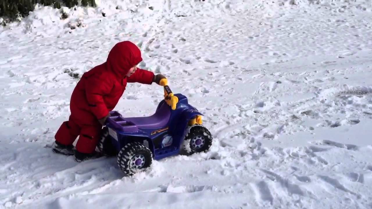 Power wheels quad in the snow YouTube