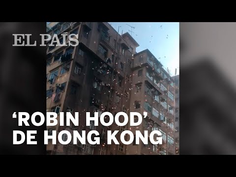 Detenido tras lanzar 6 mil dólares en un barrio pobre de Hong Kong