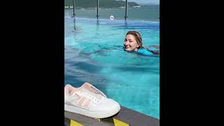 Having Fun In Wet Clothes And Wet Sneakers In The Pool