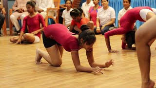 Yoga competition/championship/sports asana perform by junior young girls