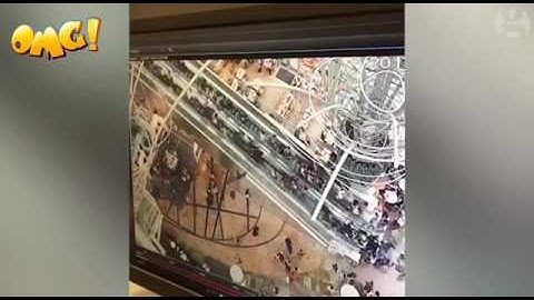 Hong Kong shoppers injured when Escalator goes into reverse – video