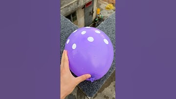 Experiment: Will a water balloon explode if it rolls down a tall building? 💥🎈#shorts