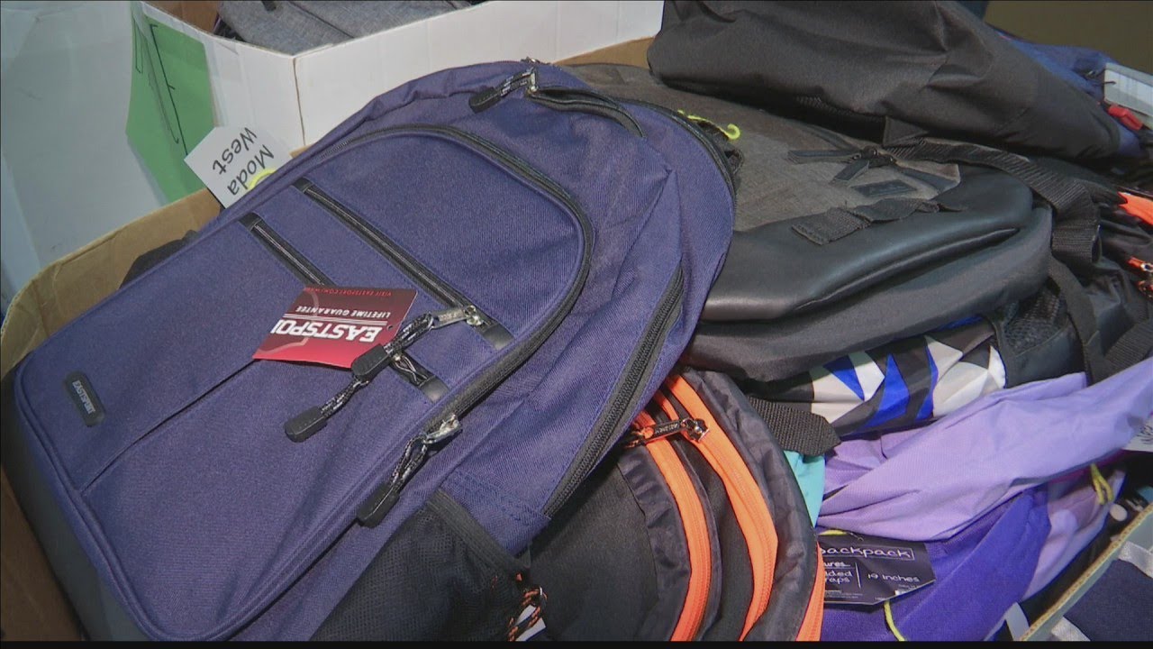 Community stuffs 6,000 backpacks for foster kids - YouTube