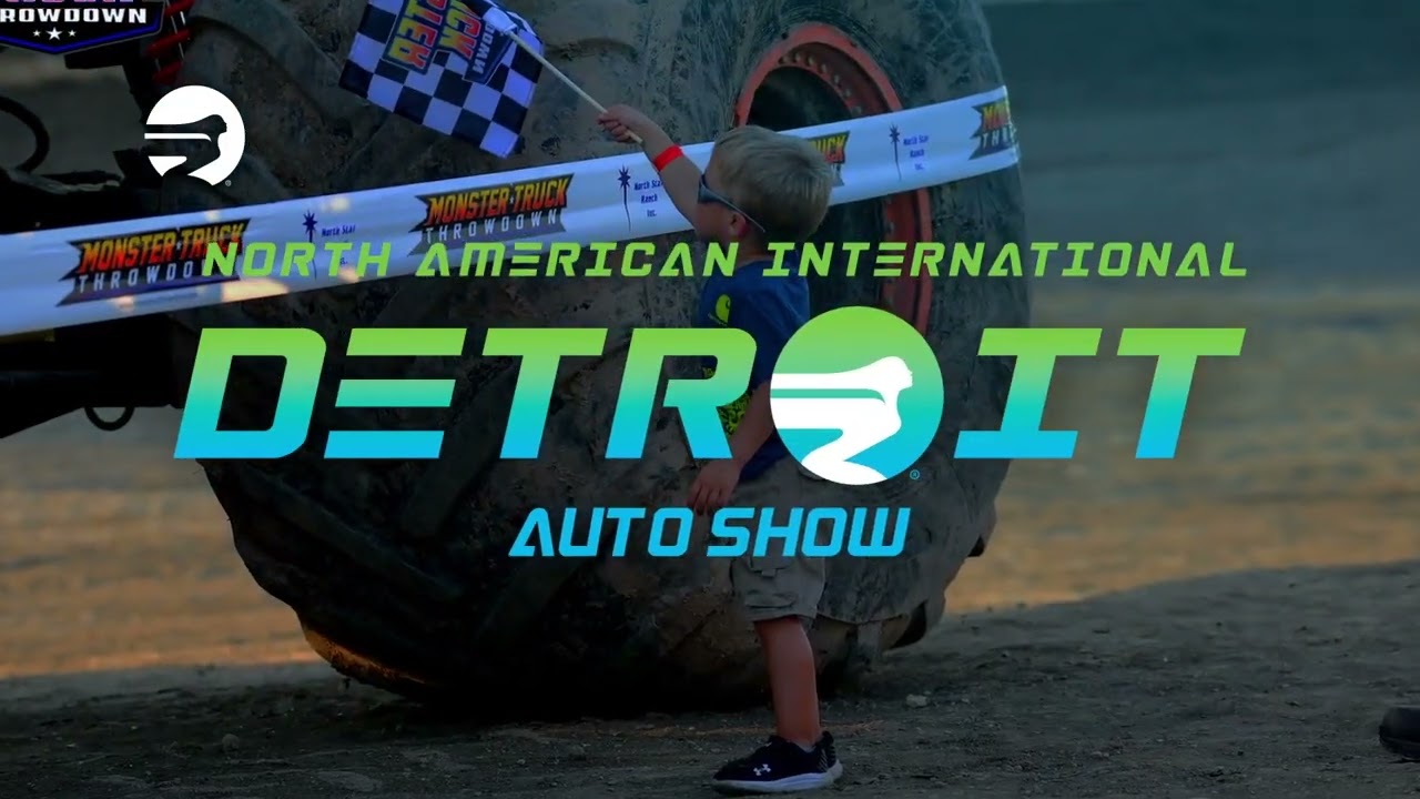 Dinosaurs, World's Largest Rubber Duck Part Of New Detroit Auto Show